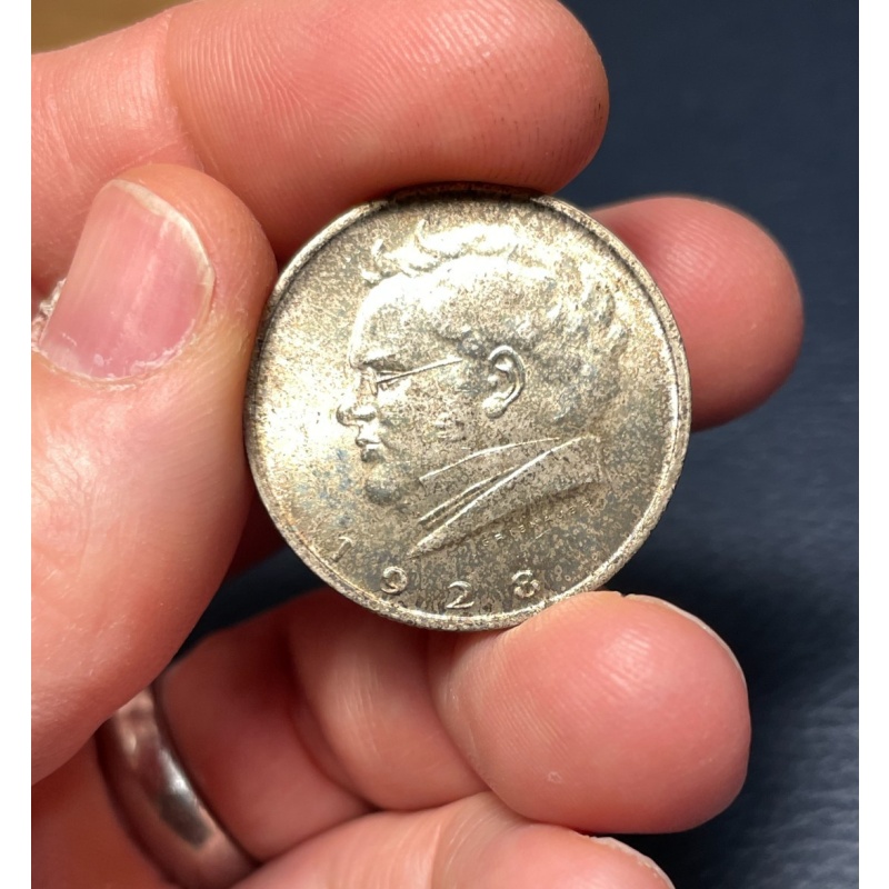 Austria : 1928.  2 schilling.  Schubert.  BU  light toning.   (see video!)